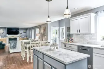 Kitchen looking into eating area and living room