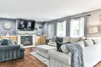 Large windows overlooking patio and back yard