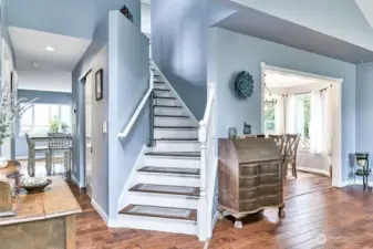 Left hall to open concept living area or formal areas to the right.