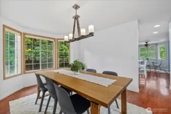 Dining area leads into kitchen.