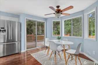 Eating area leads outside to deck and backyard.