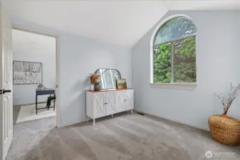 Primary suite with sitting area that also leads to extra flex space/office.