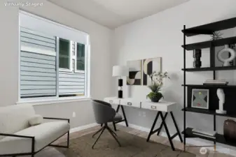 (Virtually Staged) Downstairs Den– Perfect for a home office, guest room, or additional living space.