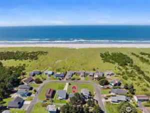 Deeded beach access with trail directly across from house
