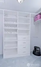 Primary bedroom closet organizer.