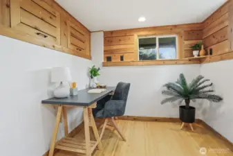 LLower level multi purpose living area:  office, bedroom, family room, etc.  Features:  bamboo floors, cedar built in storage and closet. Has a separate entry and 3/4 bathroom.