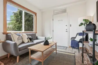 Cottage upper level living room with cork floors, cedar trim, recessed lights and westerly territorial views.