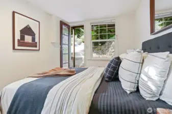 Cottage lower level bedroom and full bathroom. Can be accessed with outside level entry or by the alternating tread staircase.