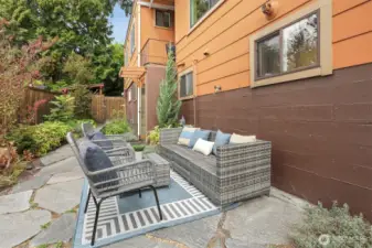 Professionally architect designed ($50,000 project)  fenced courtyard with access to the Main south home lower level and custom built cedar shed.