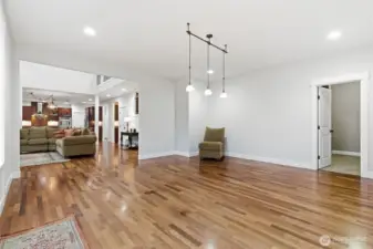 Secondary living room or flex space looking across the living room to kitchen