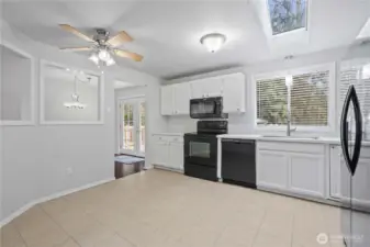 Kitchen with updated counters and back splash