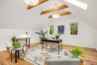 This bonus space has amazing light and vaulted ceilings.