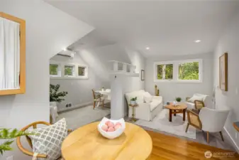 The bonus The space over the garage is great for a home office, guest space or artist studio. Light and bright!