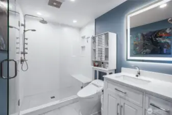 Primary en suite bathroom with heated floors.