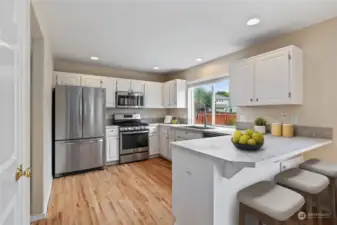 Entertainer's Kitchen provides great flow and space for entertaining and more than one cook in the kitchen.  Virtually furnished to show versatility