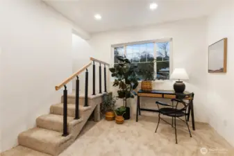 Newly carpeted rec room off living room.