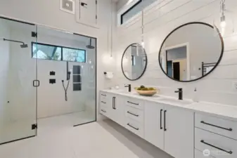 Owner's retreat with soaking tub, dual sinks, walk-in shower, heated floors