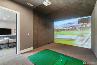 dedicated room off family room for the golf simulator