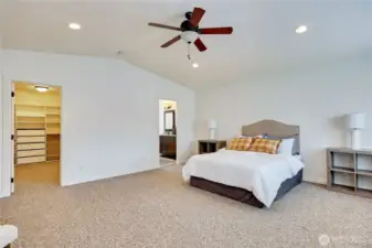 The door to the giant walk-in closet is on the left, and the full bathroom on the right.