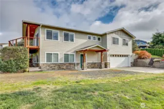 This spacious home is set at the top of a quiet cul de sac, Cedar Lane.