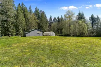 2 stall barn w/room for more and expansive greenhouse!