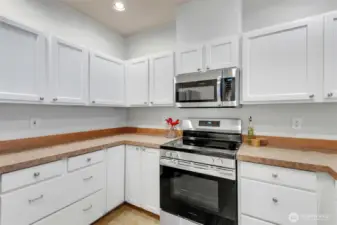 Generous cabinet storage throughout the kitchen