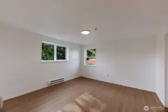 Primary suite with walk-in closet and ensuite bath