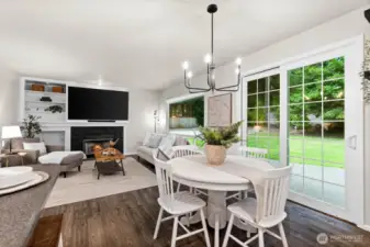 This room opens up to an expansive backyard patio where you can host an unforgettable day.