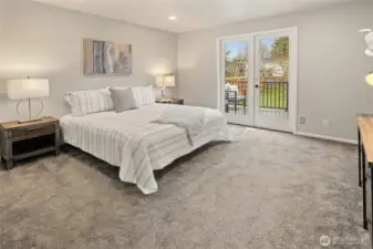 Primary suite with french doors out to the West facing deck