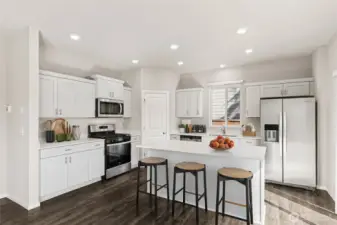 Kitchen island with seating.  Colors and finishes may vary.
