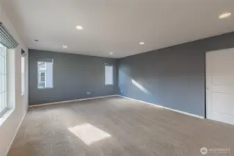 Another view of the bonus room. Ideal for media, play, fitness, or flexible living.