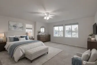 Virtually staged. Generous primary bedroom with natural light and private bath.