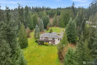 "back" view of the home as you drive up the driveway.