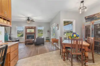 Kitchen seating overlooks living room.