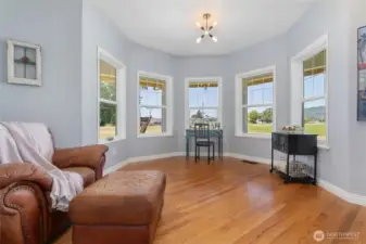 Private office with views and French doors.  Can be easily transformed into 4th bedroom on primary level! Furniture recently rearranged.