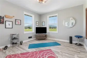 Bedroom 2 with gorgeous mountain views. Now staged.