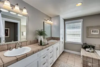 with double vanity, spa tub, walk-in shower