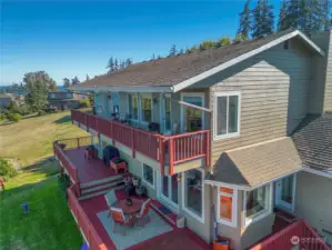 Covered view decks maximize indoor-outdoor living with beauty & nature