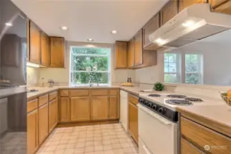 Kitchen with garden window open to dining area.