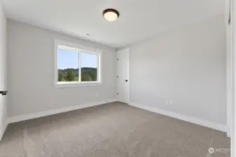 Bedroom 4 upstairs with dual closets.