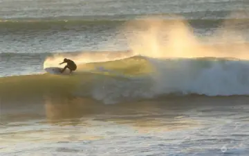 Surfing close by at the Jetty