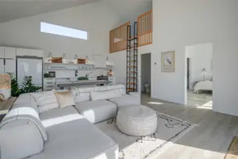 The Great Room upstairs is where you'll want to be!  View of ladder to cozy loft just off kitchen.