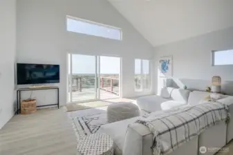 View out to the deck off great room.  Plenty of space to make the TV area bigger if desired.
