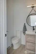 Half bath off great room for guests.