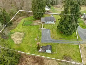 Three home gated community. At the end of a 1.5 mile dead end road. 1.03 rural acre west of I-5