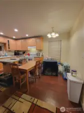 Kitchen with eating area ... and inside furry family member kennel.