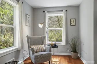 Expansive windows throughout offer unobstructed views of the tranquil outdoors, bringing nature’s beauty inside while maintaining complete privacy.