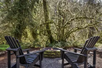 Relax by the fire pit, listening to the soothing sounds of the year-round creek.