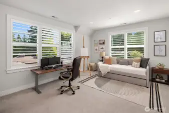 Two additional well-appointed bedrooms complete the upper sanctuary.
