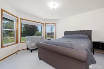 Main floor bedroom with walk in closet and attached to Bathroom